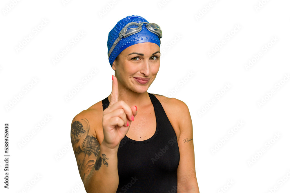 Young caucasian swimmer woman isolated on green chroma background showing number one with finger.