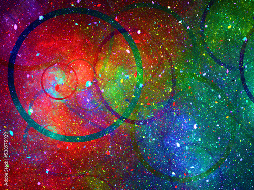 Fotografie Creación de arte fractal digital compuesto de círculos negros solapados sobre un fondo multicolor estrellado en lo que aparentan ser unos anillos gigantescos recolectores de energía