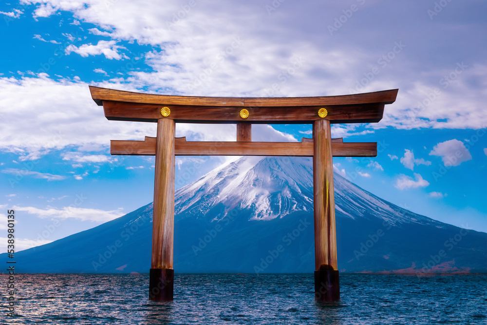 Buddhist wooden arch. Traditional Buddhist gate in water. Wooden ancient arch is located in lake. Buddhist gate in front of volcano. Arch for pilgrimage. Mount Fuji. Lake Kawaguchiko in Japan Buddhist wooden arch. Traditional Buddhist gate in water. Wooden ancient arch is located in lake. Buddhist gate in front of volcano. Arch for pilgrimage. Mount Fuji. Lake Kawaguchiko in Japan