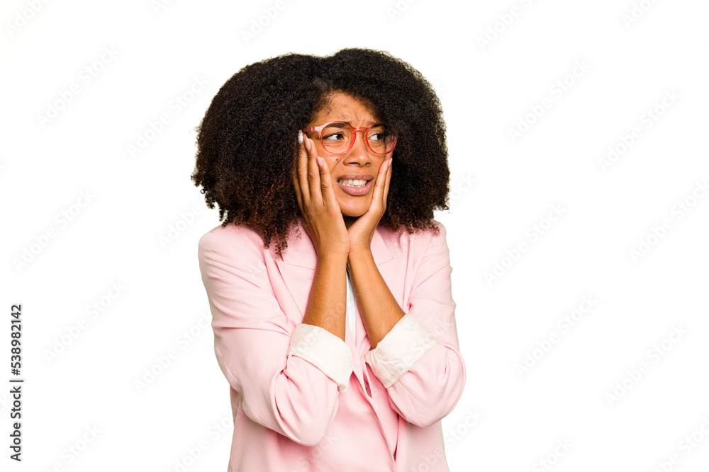 Young African American woman isolated scared and afraid. Young African American woman isolated scared and afraid.