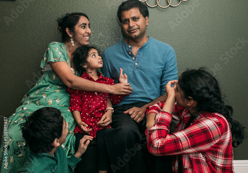 Portrait of a blended family dressed for thanksgiving  photo