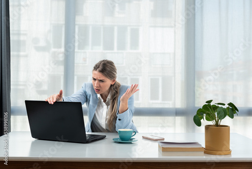 Frustrated annoyed woman confused by computer problem, annoyed businesswoman feels indignant about laptop crash, bad news online or disgusting video on web, stressed student looking at broken pc