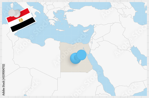 Map of Egypt with a pinned blue pin. Pinned flag of Egypt.