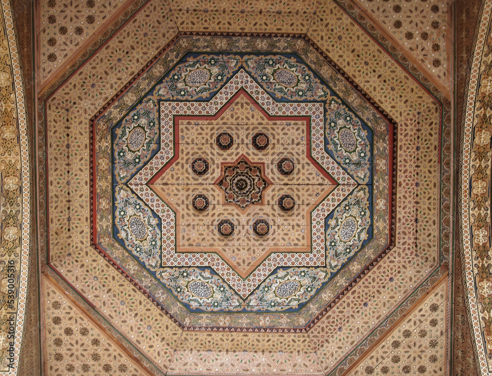 Close-up photo of a decorated ceiling inside Bahia Palace, Marrakech, Morocco