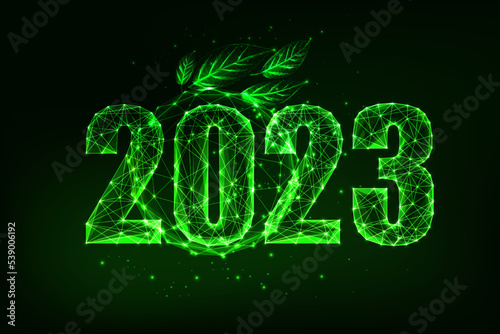 Sustianable future 2023 New Year web banner with green digits and leaves. ESG 2023 plan. photo