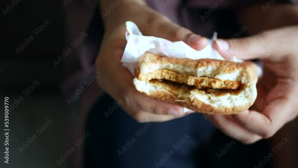women hand holding beef burger top view women hand holding beef burger top view