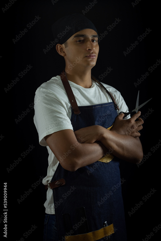 tough guy barber posing with his apron and arms crossed wearing bandanas tough guy barber posing with his apron and arms crossed wearing bandanas
