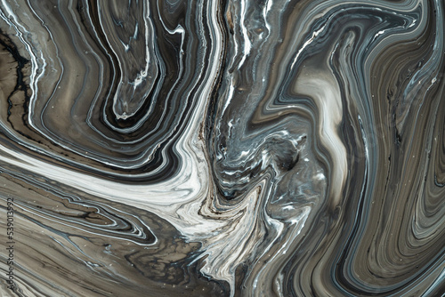 Abstract background from flowing colored liquid paints © potas
