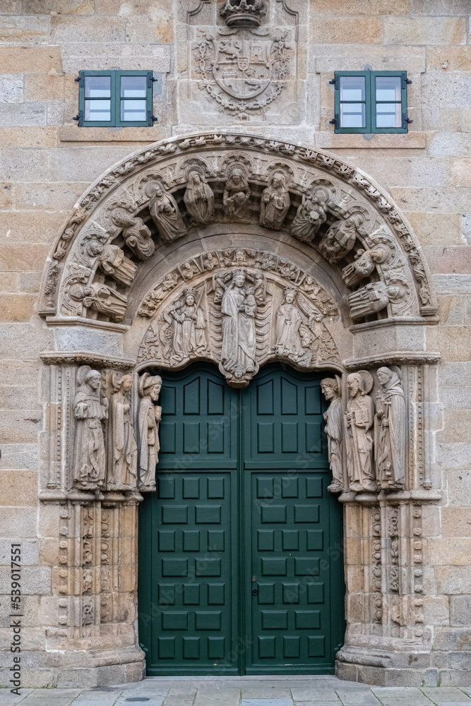 Beautiful facade with reliefs and entrance door to the Colegio de San Jerónimo, Santiago de Compostela, Galicia, Spain. Santiago's road.