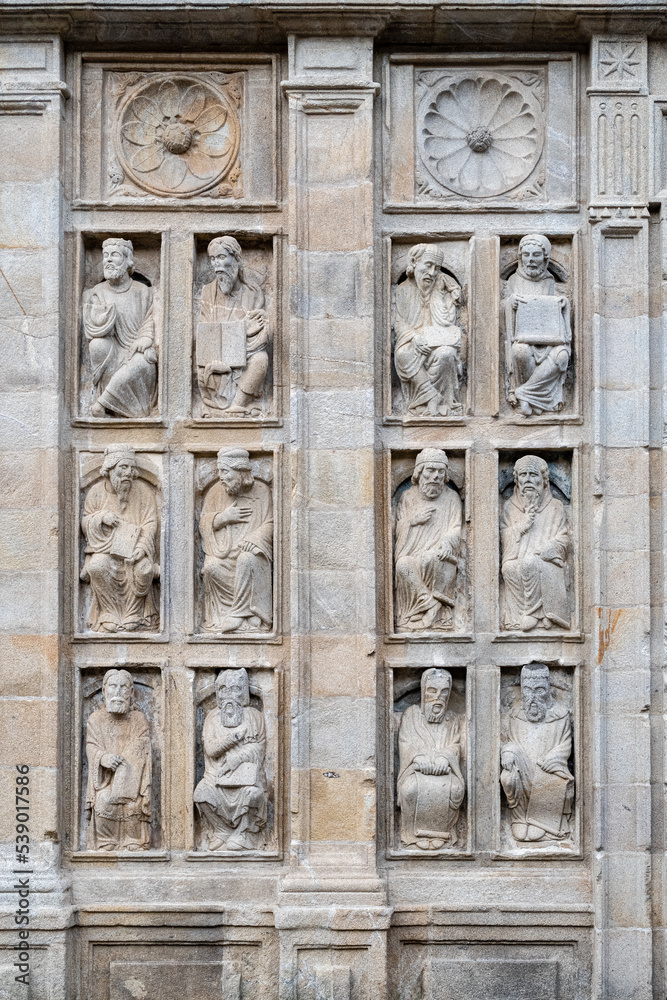 Relief figures of prophets and apostles. East facade, Gate of Forgiveness or Santa., Cathedral of Santiago de Compostela, Galicia, Spain.
