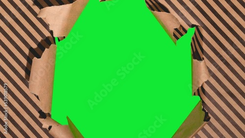 Unwrapping gift revealing a green screen - Stop Motion Animation - Craft paper gift wrapping with red bow