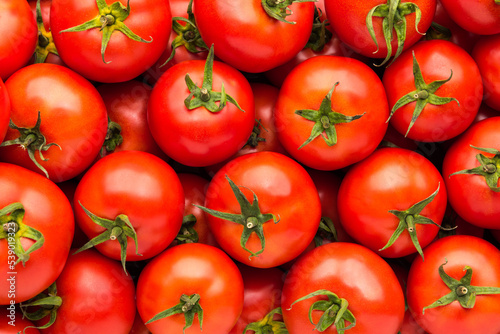 Full frame background pattern of fresh tomatoes, close up, high angle view