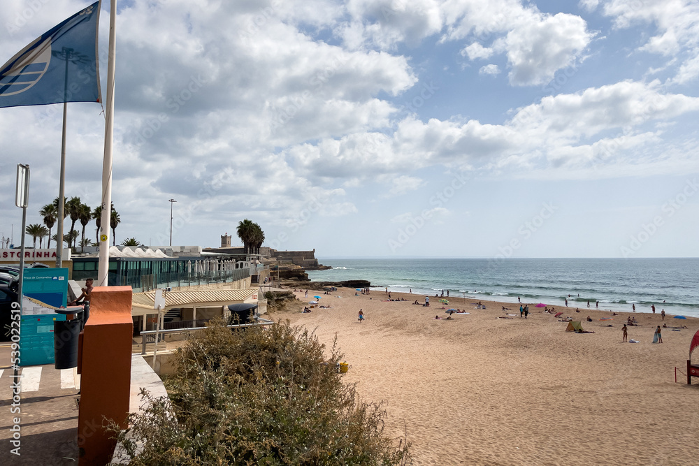 Naklejka premium People enjoying their time on the beach in Carcavelos, Portugal