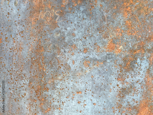 Rusty old iron red scratched metal corrosed sheet surface background, texture industrial in loft style