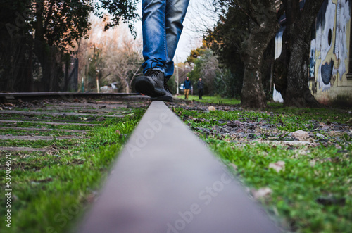 Someone walking along the railroad tracks (ID: 539024570)