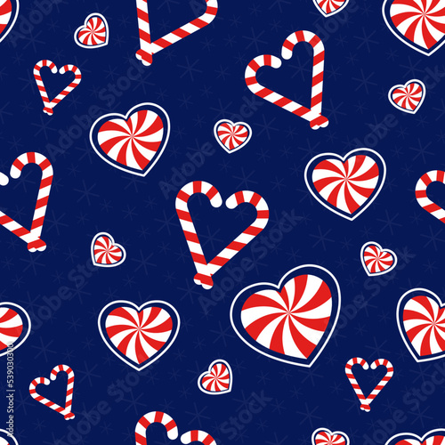 Romantic Christmas. Seamless vector illustration with heart-shaped candy canes. Winter backdrop