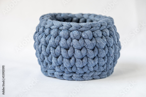 crocheted cute dusty blue basket, stuff organizer, crochet baskets bottom, pattern for crocheting, nature-friendly sustainable handicraft business, cute interior items. Space for your text