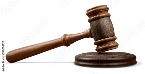 Wooden gavel on wooden table, on  background