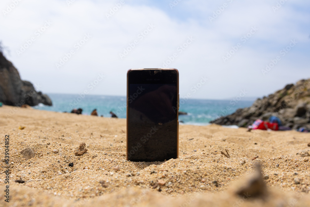 cellphone in the sand