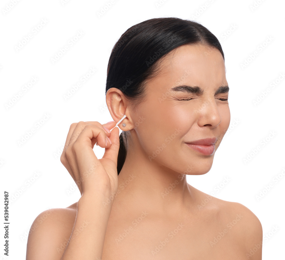 Young woman cleaning ear with cotton swab on white background Young woman cleaning ear with cotton swab on white background