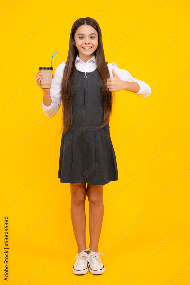 Teen girl holding coffee cup. Coffee break and recess. Teenager hold plastic take away cup, drink cocoa, coffee or tea beverage. Teen girl holding coffee cup. Coffee break and recess. Teenager hold plastic take away cup, drink cocoa, coffee or tea beverage.