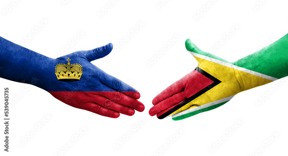 Handshake between Guyana and Liechtenstein flags painted on hands, isolated transparent image.