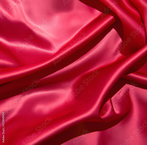 Texture of deep red silk fabric. Beautiful rose red soft silk fabric.
