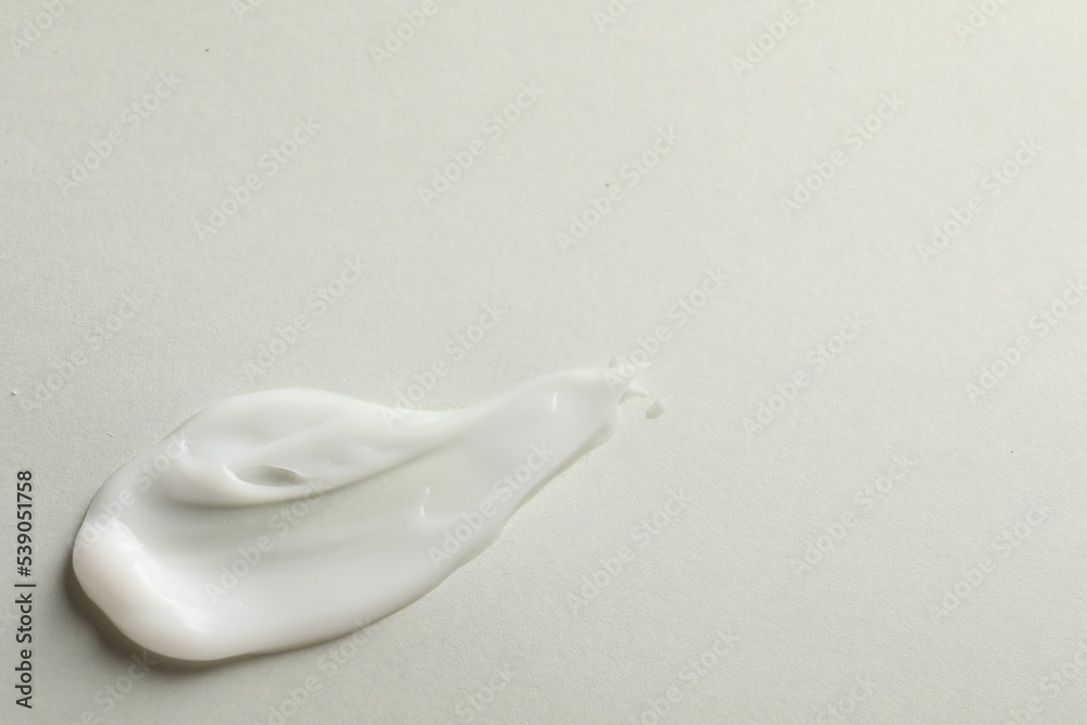 Sample of face mask on light background, top view. Space for text Sample of face mask on light background, top view. Space for text