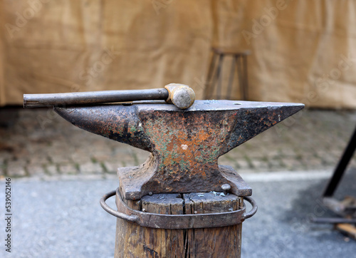 Old anvil with hammer