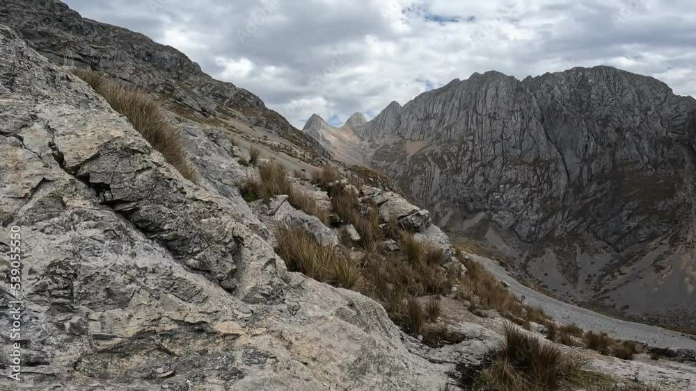 Trekking in high mountains in the Peruvian Andes. Andean scene over 4000masl during dry season. Trekking in high mountains in the Peruvian Andes. Andean scene over 4000masl during dry season.