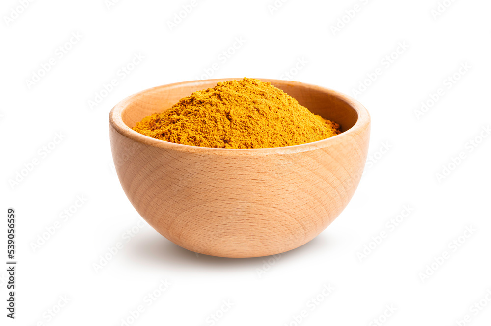 Turmeric powder in wooden bowl on white background. Turmeric powder in wooden bowl on white background.