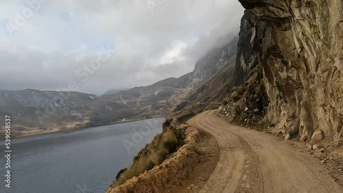 Road trip in the Peruvian Andes. High altitude mountains trip by car crossing the Andean country side. 