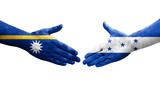 Handshake between Honduras and Nauru flags painted on hands, isolated transparent image.