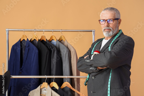Mature fashion designer and...