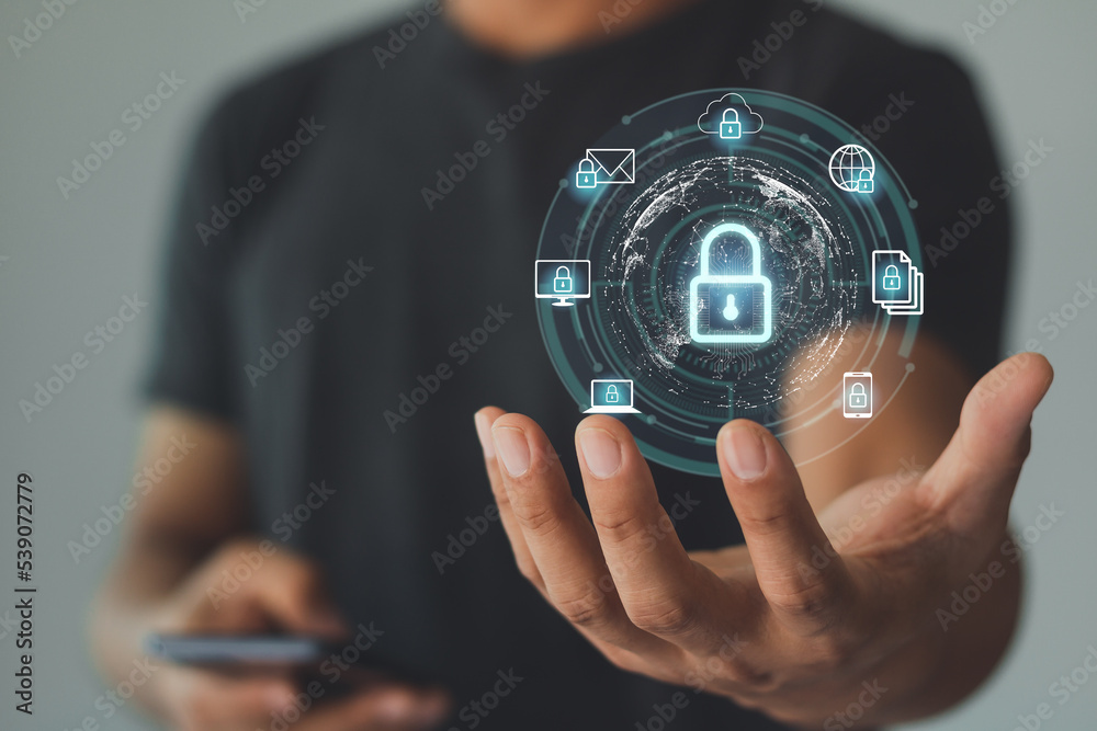 Cyber security Data Protection Information privacy antivirus virus defense internet technology concept. The business person showing icon security on a virtual screen in hand. Cyber security Data Protection Information privacy antivirus virus defense internet technology concept. The business person showing icon security on a virtual screen in hand.