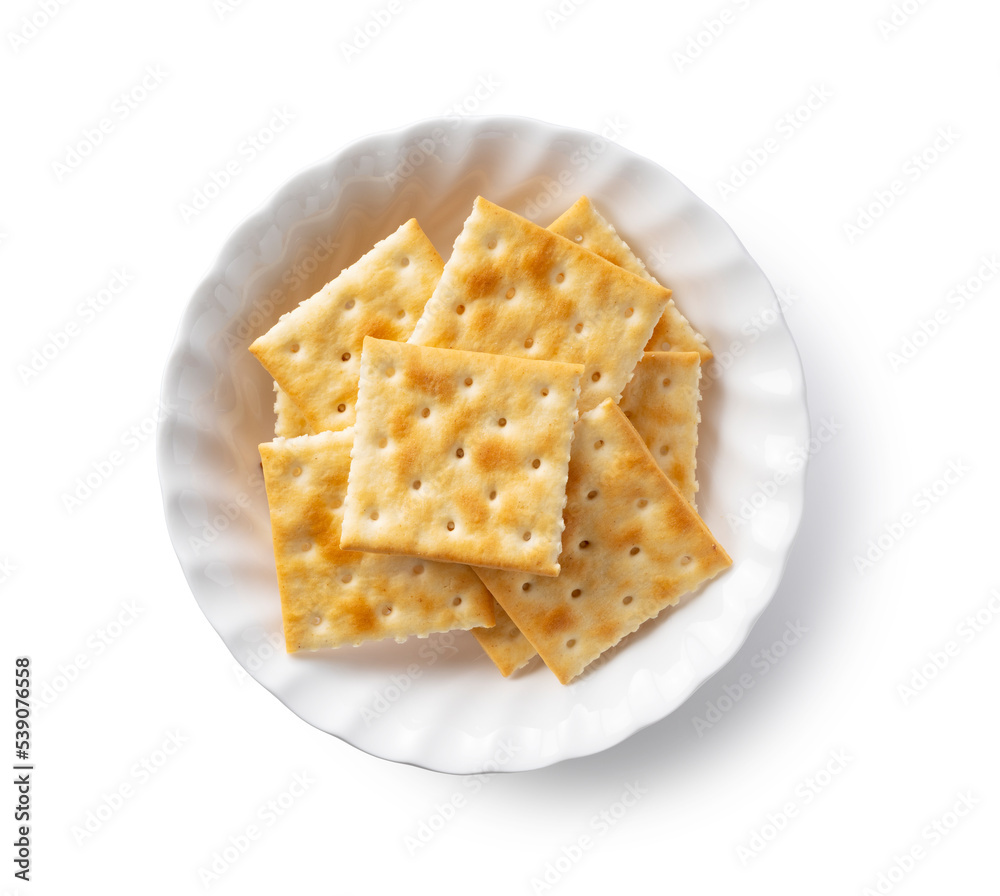 Crackers in a dish placed on a white background. Crackers in a dish placed on a white background.