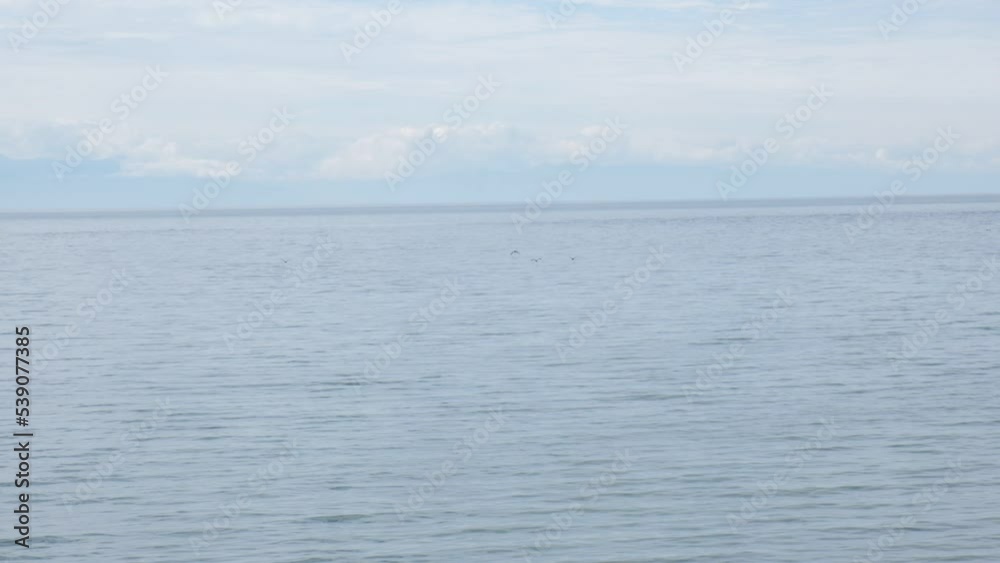 Slow motion, calm open sea, tranquil ethereal view. Empty template for text. Harmony, relax, meditating and mental health concept. Dreamy scenery Slow motion, calm open sea, tranquil ethereal view. Empty template for text. Harmony, relax, meditating and mental health concept. Dreamy scenery