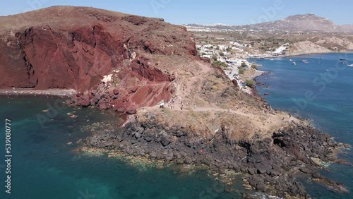 Aerial overview of Red Beach cliff rock in Santorini, Greece photo