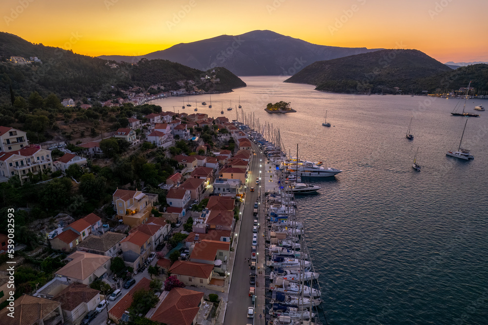 Fototapeta premium Panoramic view during sunset of the picturesque village Vathy the capital of Ithaca island, Ionian, Greece