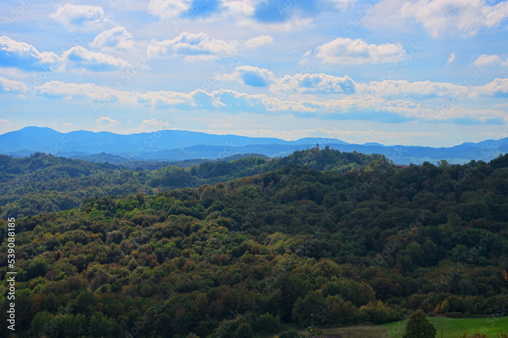 Forest and mountains in autumn colors