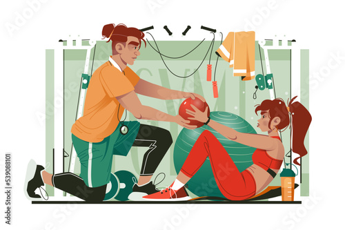Fitness coucher training woman in gym.