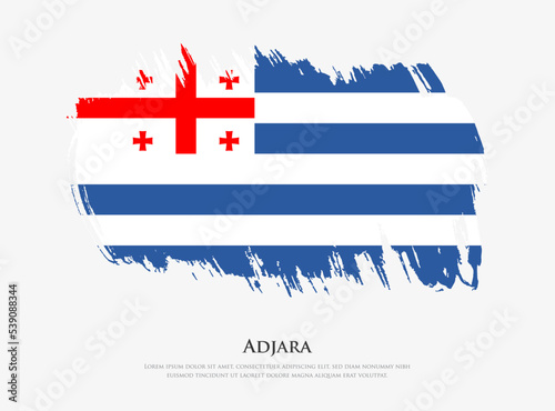 Creative textured flag of Adjara with brush strokes vector illustration