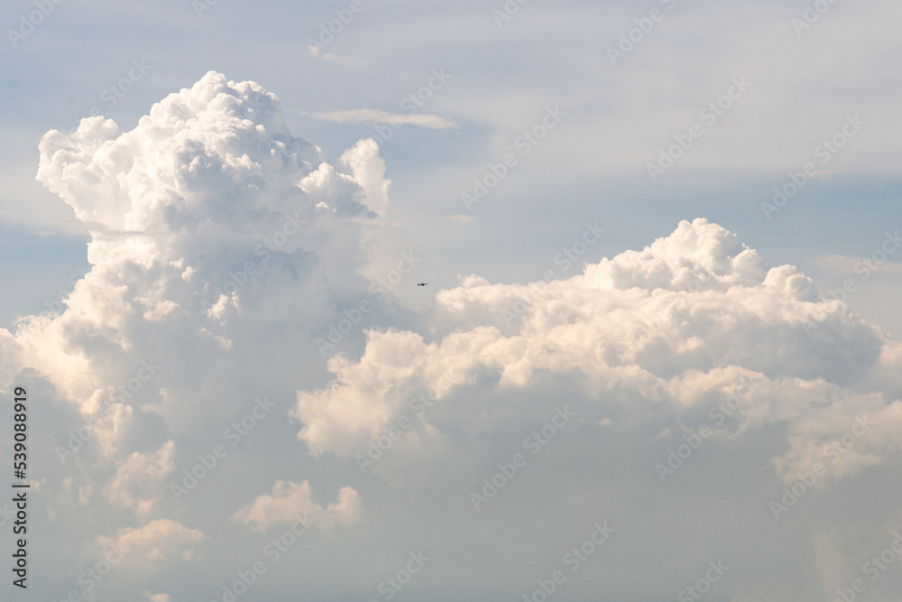 airplane in big clouds on sky of thailand airplane in big clouds on sky of thailand