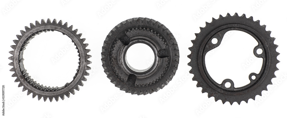 mechanical gears from the machine isolated on white background mechanical gears from the machine isolated on white background