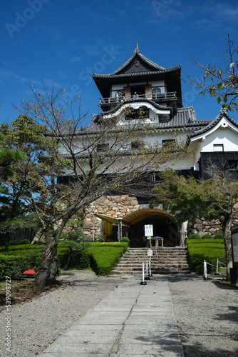 Aichi, Japan - September 10 2022: Scenery of Inuyama Castle, national historic site at summer with blue sky background, built in 1937 by Oda Hirochika. photo