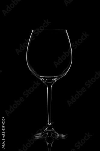 Silhouette wine glass on black