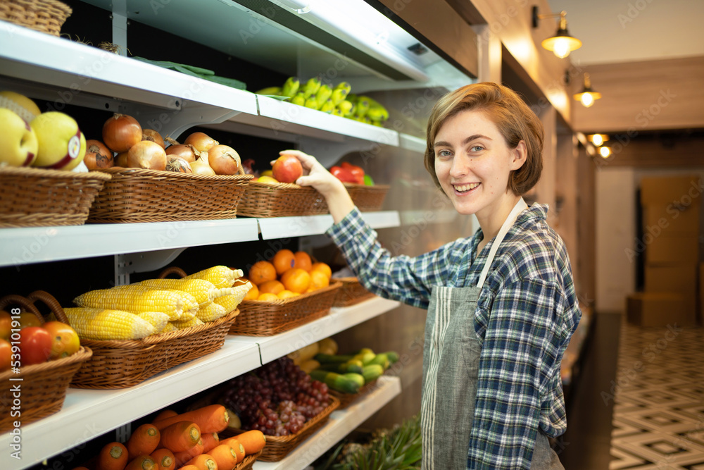 Portrait of a caucasian woman working in a supermarket or retail shop and food on grocery products. Food shopping. People lifestyle. Business service. A staff worker