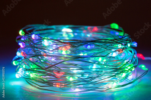 LED string lights. Party holiday christmas decoration lights. Close up christmas LED lighting photo