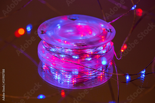 LED string lights. Party holiday christmas decoration lights. Close up christmas LED lighting photo