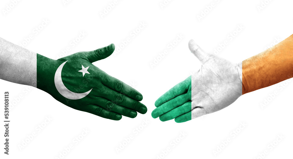 Handshake between Ireland and Pakistan flags painted on hands, isolated transparent image. Handshake between Ireland and Pakistan flags painted on hands, isolated transparent image.